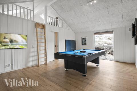 Das Luxusferienhaus 928 für 14 Personen hat einen großen Aktivitätsraum mit u. a. Billard und Darts