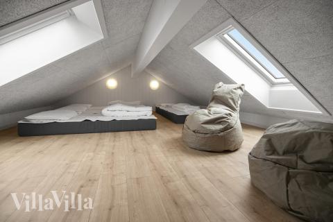 Einige der 14 Schlafgelegenheiten befinden sich im Luxusferienhaus Nr. 928 auf dem ausgebauten Dachboden