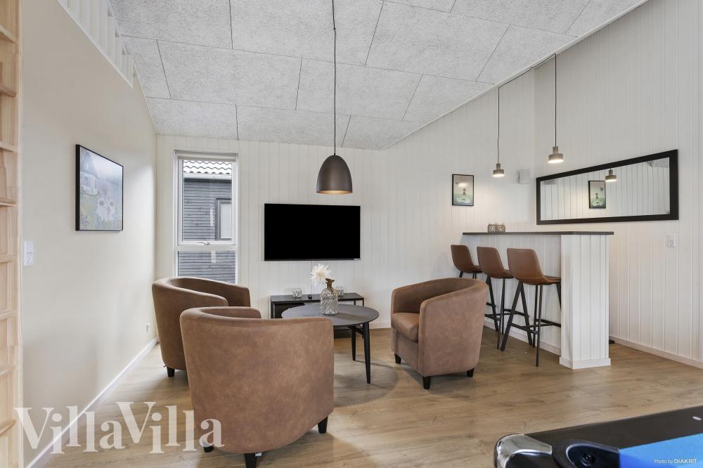Das Luxusferienhaus 916 für 18 Personen hat einen großen Aktivitätsraum mit u. a. Billard und Darts