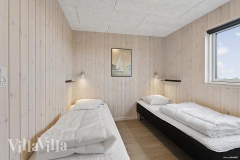 Eines der 7 Schlafzimmer im Luxusferienhaus Nr. 916