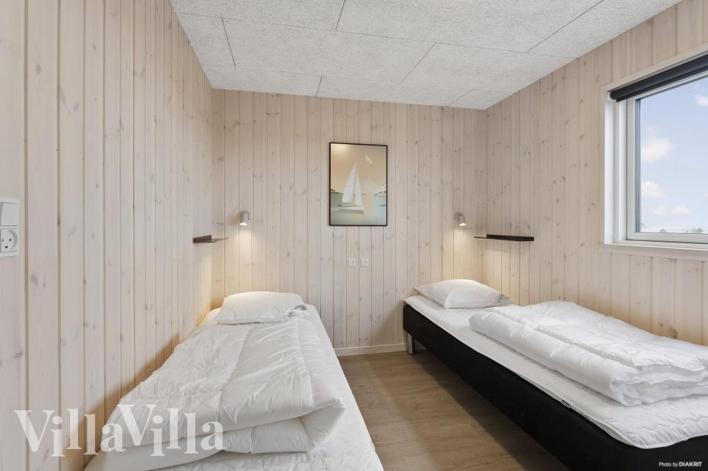 Eines der 7 Schlafzimmer im Luxusferienhaus Nr. 916