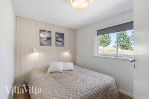 Eines der 7 Schlafzimmer im Luxusferienhaus Nr. 273