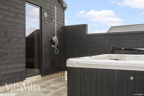Genießen Sie den warmen Whirlpool im Luxusferienhaus Nr. 914 in Lolland/Falster/Mön