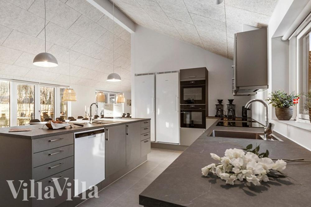 Aufenthaltsraum mit Platz für 30 im Luxusferienhaus Nr. 806.