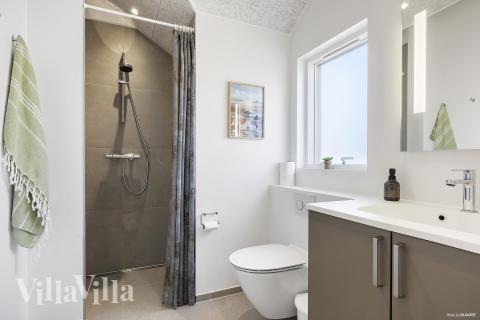 Eines der Badezimmer im Luxusferienhaus Nr. 927