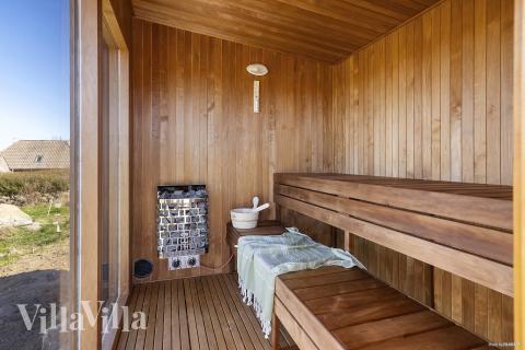 Genießen Sie die heiße Sauna im Luxusferienhaus Nr. 927 für 8 Personen