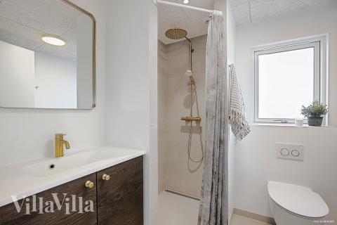 Eines der Badezimmer im Luxusferienhaus Nr. 959