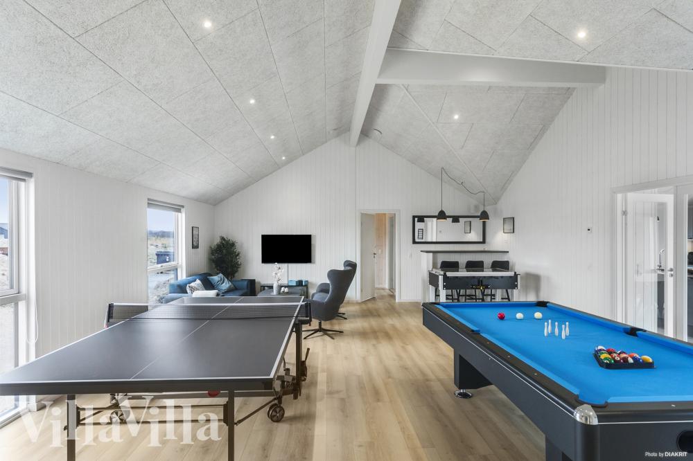 Das Luxusferienhaus 913 für 24 Personen hat einen großen Aktivitätsraum mit u. a. Billard und Darts