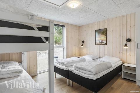 Eines der 9 Schlafzimmer im Luxusferienhaus Nr. 913