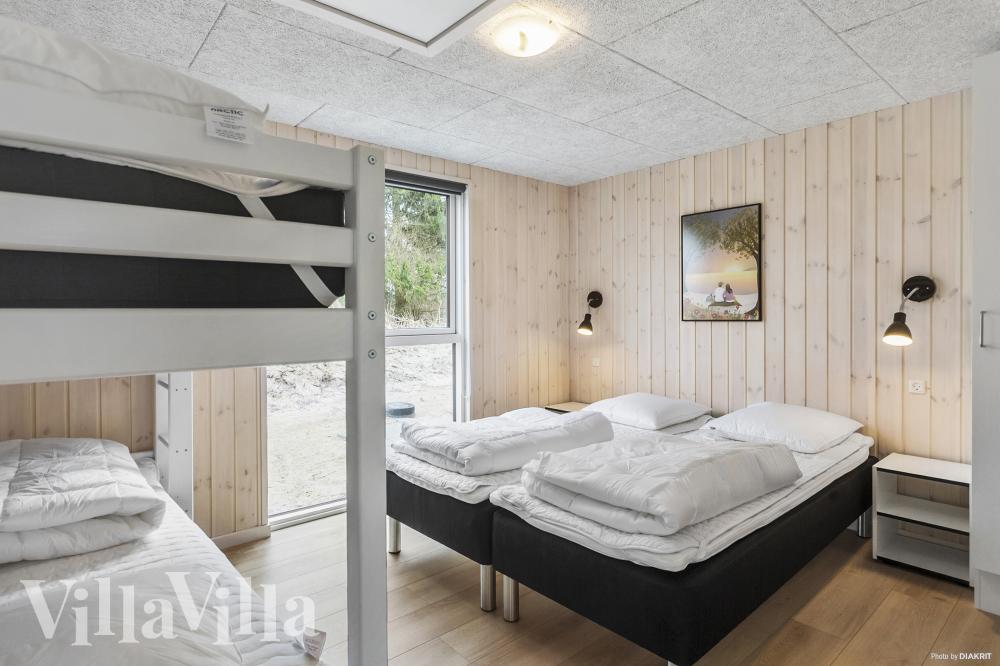 Eines der 9 Schlafzimmer im Luxusferienhaus Nr. 913