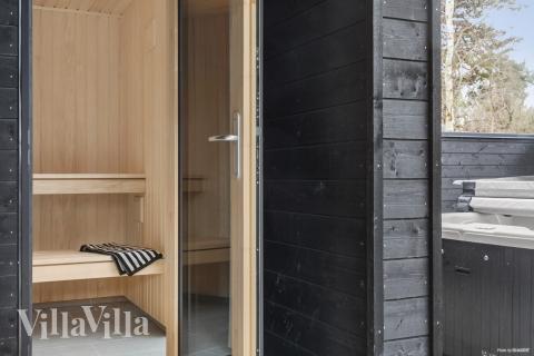 Genießen Sie die heiße Sauna im Luxusferienhaus Nr. 913 für 24 Personen