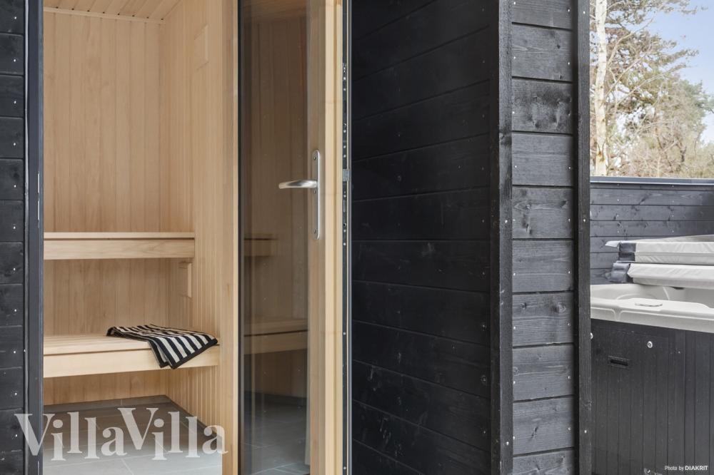 Genießen Sie die heiße Sauna im Luxusferienhaus Nr. 913 für 24 Personen