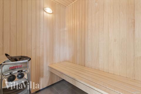 Genießen Sie die heiße Sauna im Luxusferienhaus Nr. 822 für 30 Personen