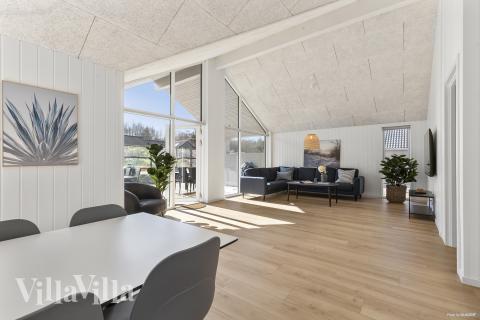 Aufenthaltsraum mit Platz für 20 im Luxusferienhaus Nr. 824.