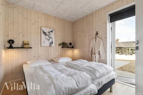 Eines der 8 Schlafzimmer im Luxusferienhaus Nr. 824