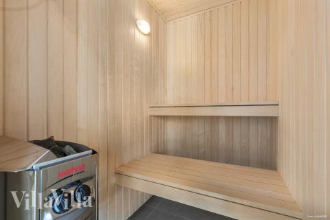 Genießen Sie die heiße Sauna im Luxusferienhaus Nr. 824 für 20 Personen