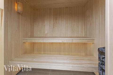 Genießen Sie die heiße Sauna im Luxusferienhaus Nr. 919 für 12 Personen