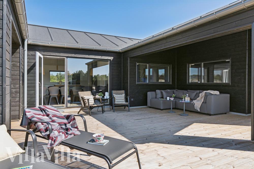 Genießen Sie einen Grillabend auf der Terrasse des Luxusferienhauses Nr. 959 in Nordjütland