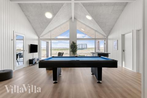 Das Luxusferienhaus 917 für 20 Personen hat einen großen Aktivitätsraum mit u. a. Billard und Darts