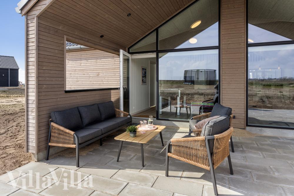 Genießen Sie einen Grillabend auf der Terrasse des Luxusferienhauses Nr. 917 in Fünen und seine Inseln
