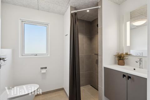 Eines der Badezimmer im Luxusferienhaus Nr. 957