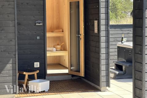 Genießen Sie die heiße Sauna im Luxusferienhaus Nr. 957 für 16 Personen