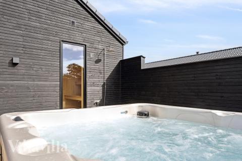 Genießen Sie den warmen Whirlpool im Luxusferienhaus Nr. 957 in Fünen und seine Inseln