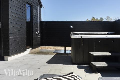 Diese schicke Haus mit Whirlpool Nr. 933 mit Platz für 20 Personen liegt in Lolland/Falster/Mön
