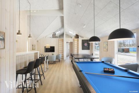 Neben den vielen schönen Stunden, die man im Poolbereich des Hauses verbringen kann, bietet das Luxusferienhaus 933 auch Spielevergnügen bei Billard/Tischtennis und Darts