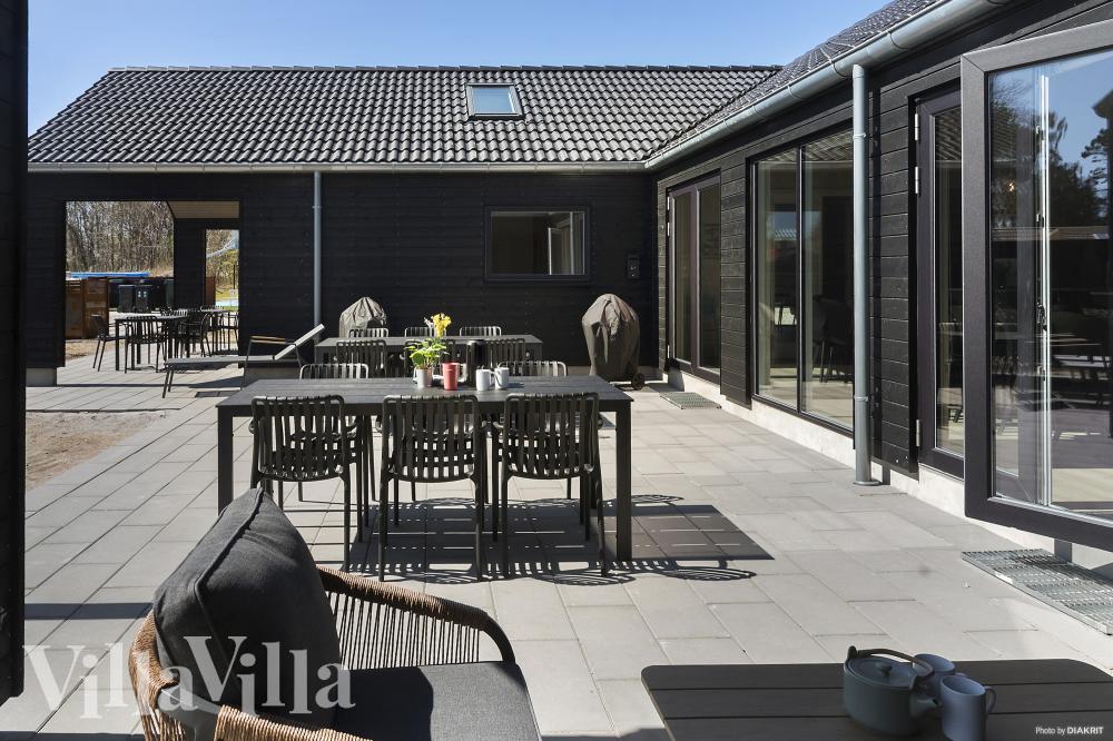 Das Luxusferienhaus Nr. 933 hat eine tolle Terrasse, die mit hochwertigen Gartenmöbeln für 20 Personen ausgestattet ist.