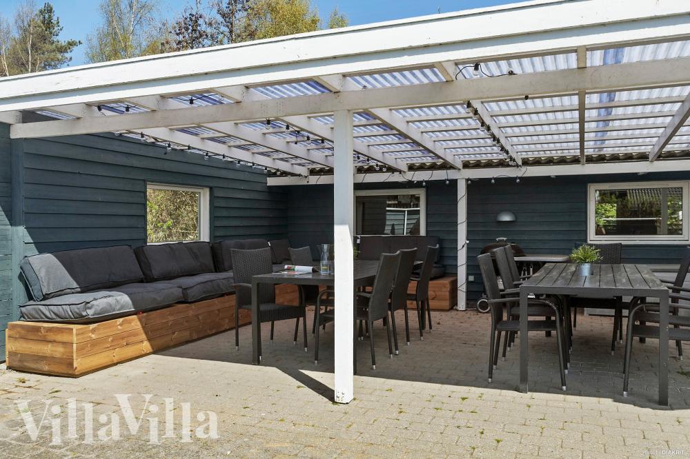 Genießen Sie einen Grillabend auf der Terrasse des Luxusferienhauses Nr. 956 in Lolland/Falster/Mön