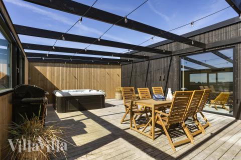 Das Luxusferienhaus Nr. 965 hat eine tolle Terrasse, die mit hochwertigen Gartenmöbeln für 12 Personen ausgestattet ist.