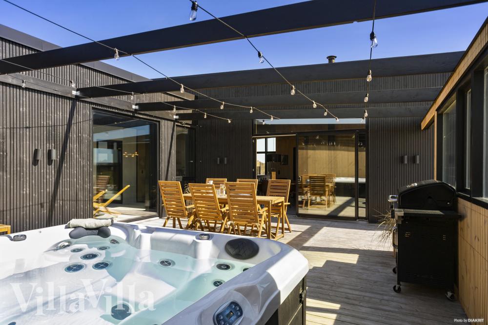 Genießen Sie den warmen Whirlpool im Luxusferienhaus Nr. 965 in Nordjütland