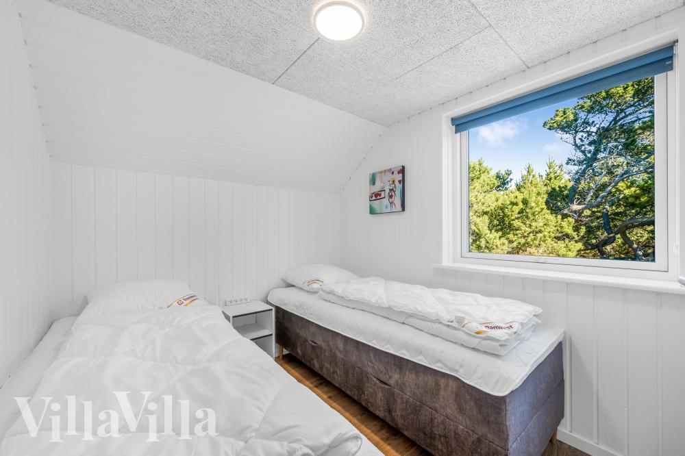 Eines der 6 Schlafzimmer im Luxusferienhaus Nr. 332