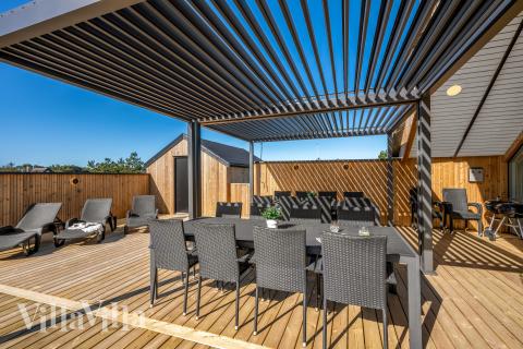 Das Luxusferienhaus Nr. 332 hat eine tolle Terrasse, die mit hochwertigen Gartenmöbeln für 20 Personen ausgestattet ist.
