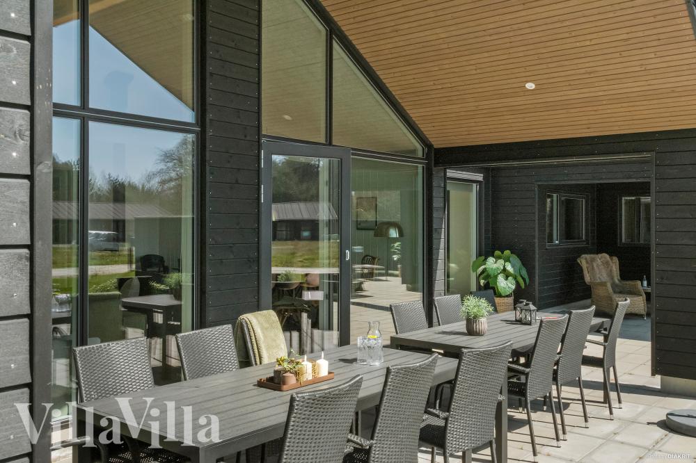 Das Luxusferienhaus Nr. 621 hat eine tolle Terrasse, die mit hochwertigen Gartenmöbeln für 16 Personen ausgestattet ist.