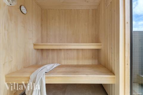 Genießen Sie die heiße Sauna im Luxusferienhaus Nr. 560 für 16 Personen
