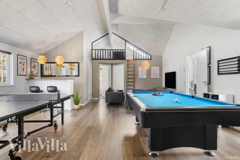 Neben den vielen schönen Stunden, die man im Poolbereich des Hauses verbringen kann, bietet das Luxusferienhaus 351 auch Spielevergnügen bei Billard/Tischtennis und Darts