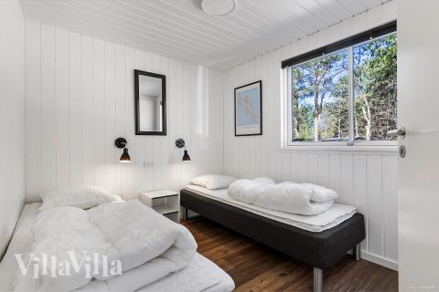 Eines der 8 Schlafzimmer im Luxusferienhaus Nr. 351