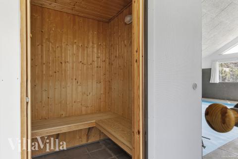 Genießen Sie die heiße Sauna im Luxusferienhaus Nr. 351 für 22 Personen