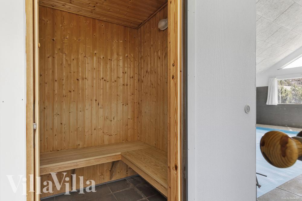 Genießen Sie die heiße Sauna im Luxusferienhaus Nr. 351 für 22 Personen