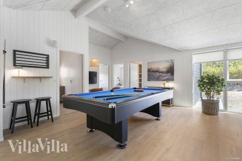 Das Luxusferienhaus 931 für 14 Personen hat einen großen Aktivitätsraum mit u. a. Billard und Darts
