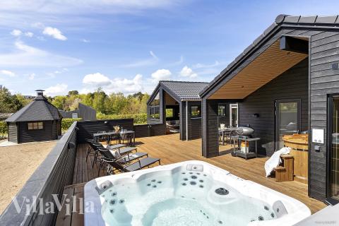 Das Luxusferienhaus Nr. 931 bietet u. a. einen tollen Whirlpool