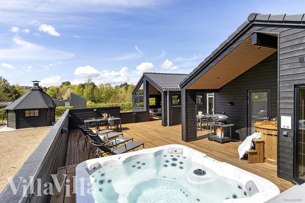 Das Luxusferienhaus Nr. 931 bietet u. a. einen tollen Whirlpool