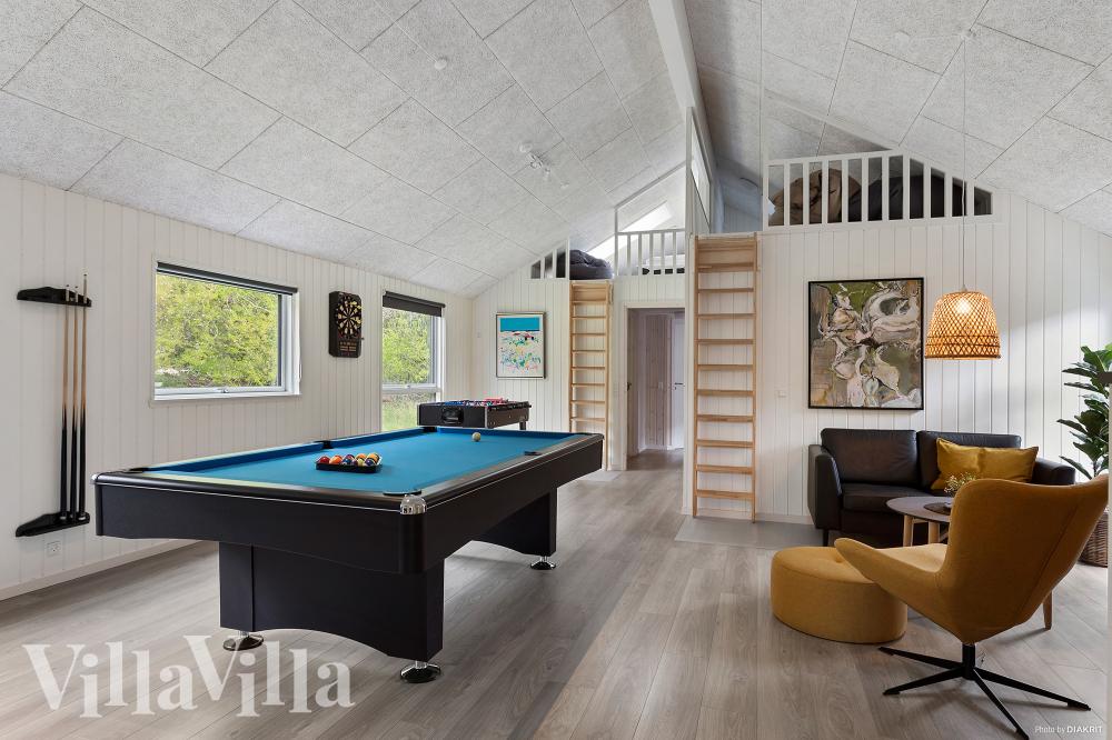 Neben den vielen schönen Stunden, die man im Poolbereich des Hauses verbringen kann, bietet das Luxusferienhaus 622 auch Spielevergnügen bei Billard/Tischtennis und Darts