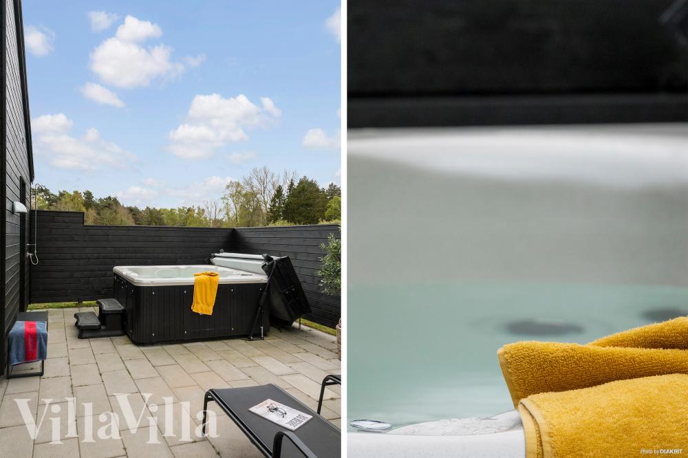 Genießen Sie den warmen Whirlpool im Luxusferienhaus Nr. 622 in Bornholm