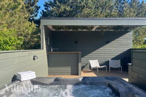Genießen Sie den warmen Whirlpool im Luxusferienhaus Nr. 926 in Ostjütland
