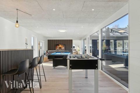 Neben den vielen schönen Stunden, die man im Poolbereich des Hauses verbringen kann, bietet das Luxusferienhaus 967 auch Spielevergnügen bei Billard/Tischtennis und Darts