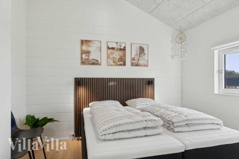 Eines der 7 Schlafzimmer im Luxusferienhaus Nr. 967