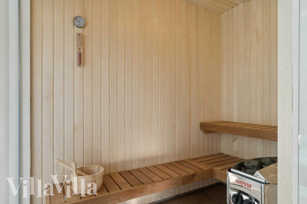 Genießen Sie die heiße Sauna im Luxusferienhaus Nr. 967 für 22 Personen